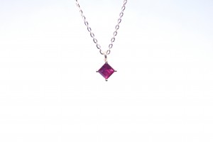 Rose gold pendant with ruby